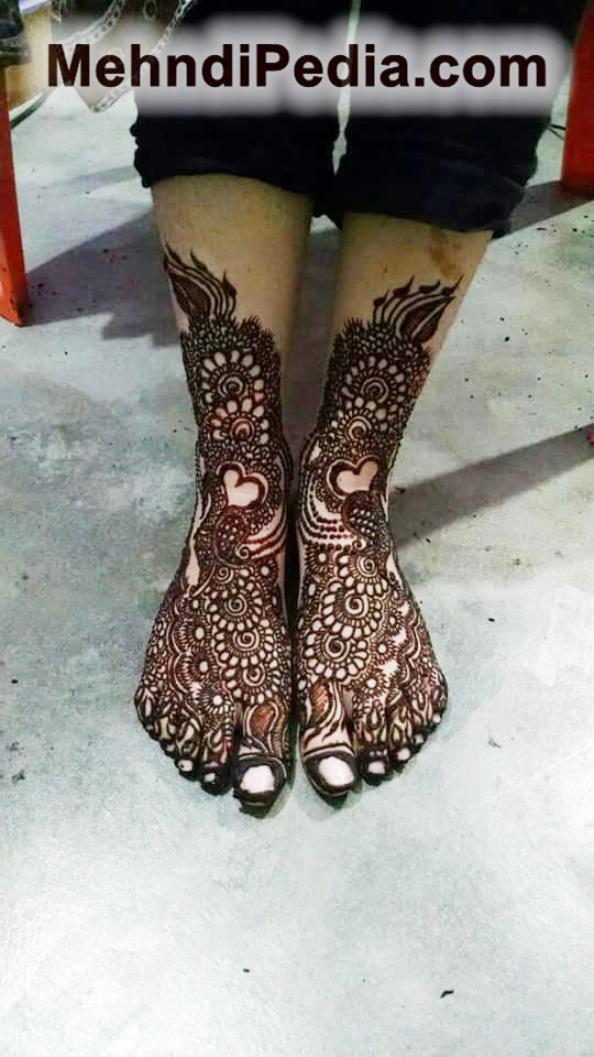 henna inspired foot tattoos