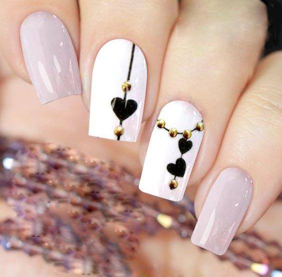 Pink Autumnal Nails with heart sign