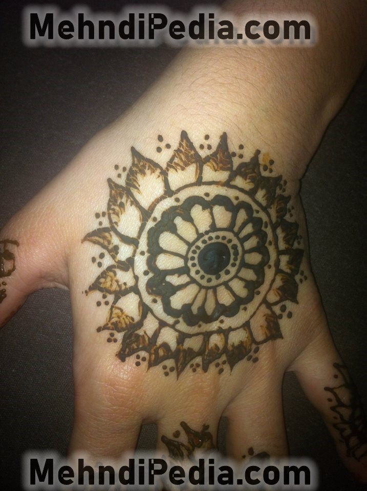 back hand circle henna designs